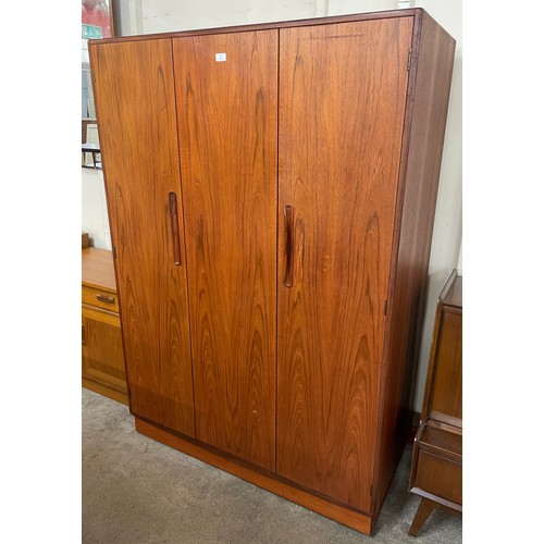 8 - A G-Plan Fresco teak three door wardrobe