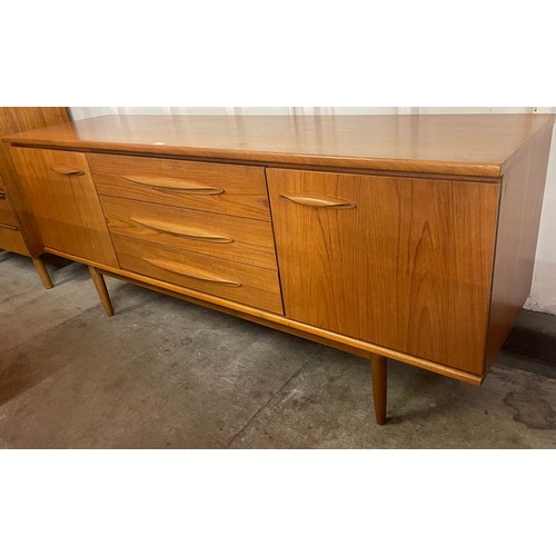 4 - A teak sideboard