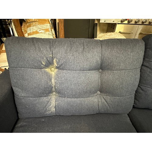 1573 - A blue upholstered three seater sofa - damaged