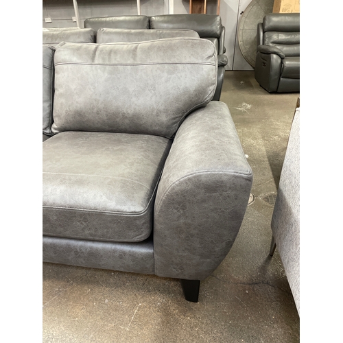 1465 - A charcoal PU leather three seater sofa