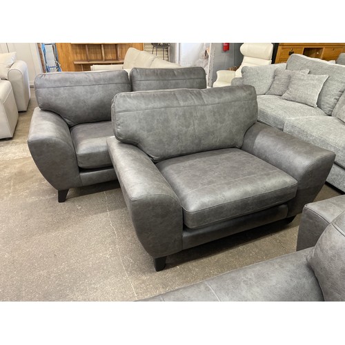 1466 - A charcoal PU leather three seater sofa and two seater sofa