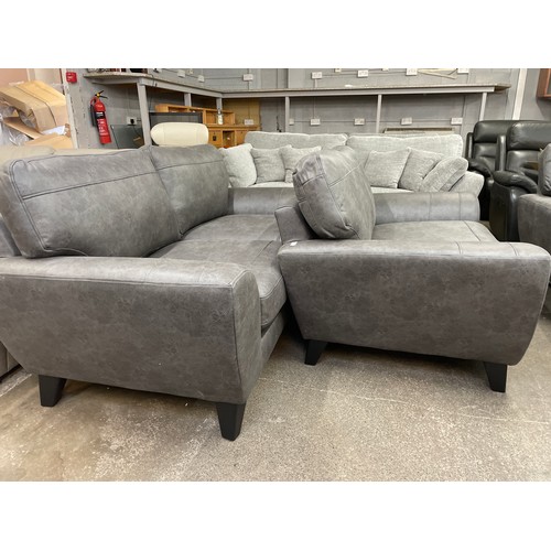 1466 - A charcoal PU leather three seater sofa and two seater sofa