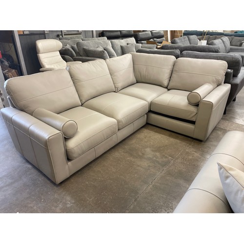 1469 - A stone leather corner sofa