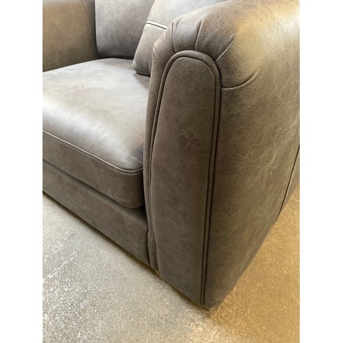 1475 - A charcoal PU cuddle sofa