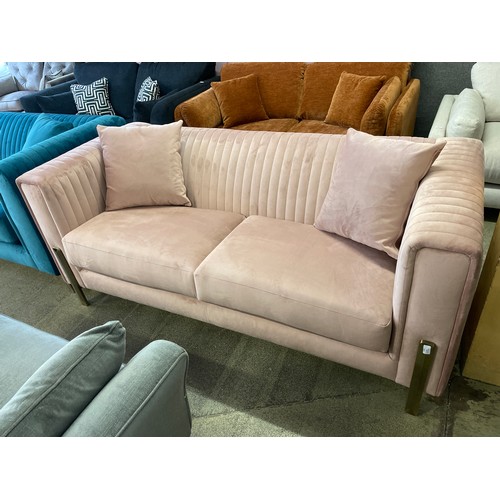 1483 - A pink velvet deco three seater sofa