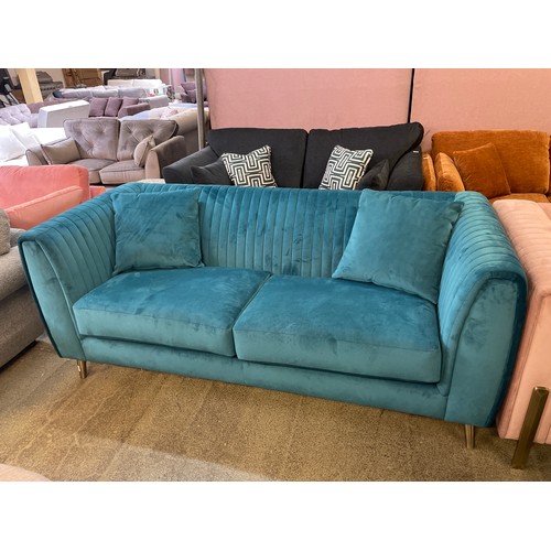 1484 - A turquoise velvet deco three seater sofa