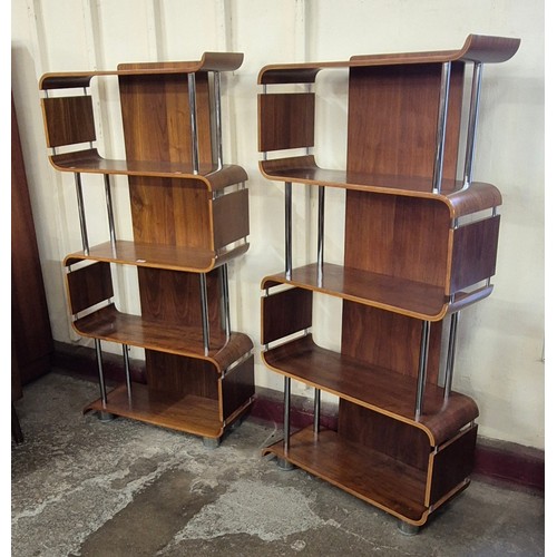 19 - A pair of walnut and chrome four tier room dividers