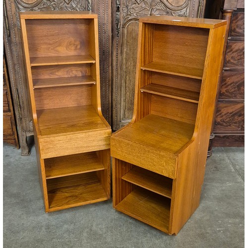 7 - A pair of tall teak bedside cabinets