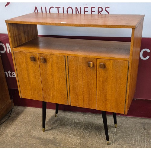 11 - A teak record cabinet