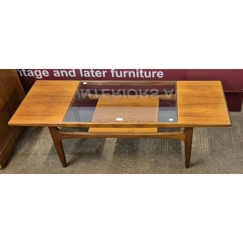 19 - A G-Plan Fresco teak and glass topped coffee table