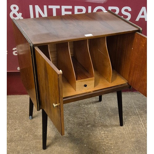 21 - A walnut record cabinet