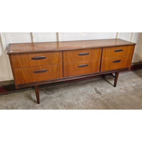 22 - A teak sideboard