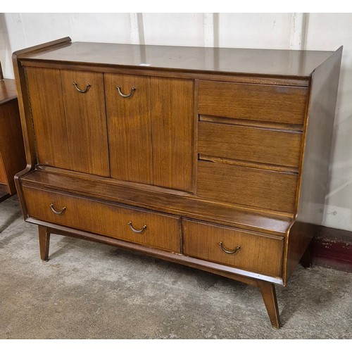 31 - A Wrighton tola wood highboard