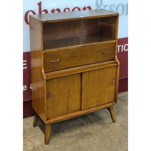 33 - A tola wood writing cabinet/bookcase