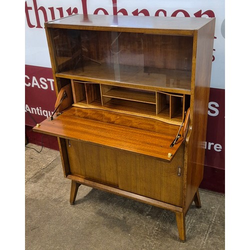 33 - A tola wood writing cabinet/bookcase