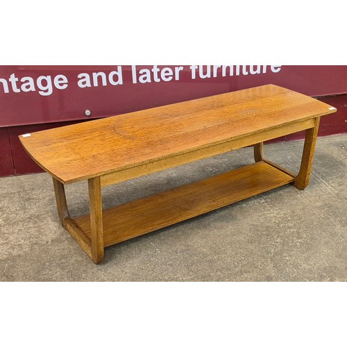 54 - A teak coffee table