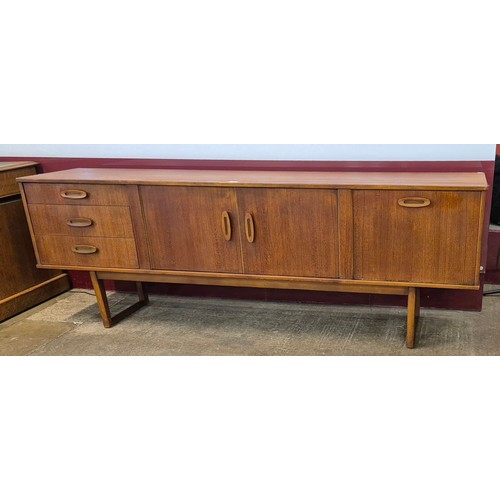 32 - A teak sideboard