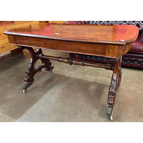 126 - A William IV mahogany two drawer library table