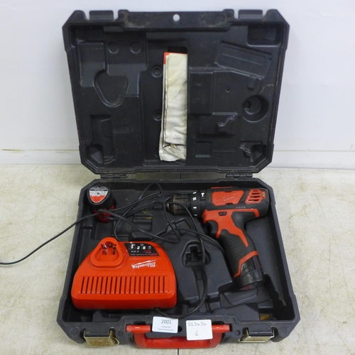 2001 - A Milwaukee M12BPD cordless power drill with two 12v Li-ion batteries and charger