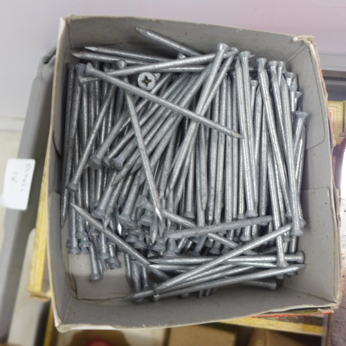 2013 - A box of assorted screws, oval nails, masonry nails and tacks etc.