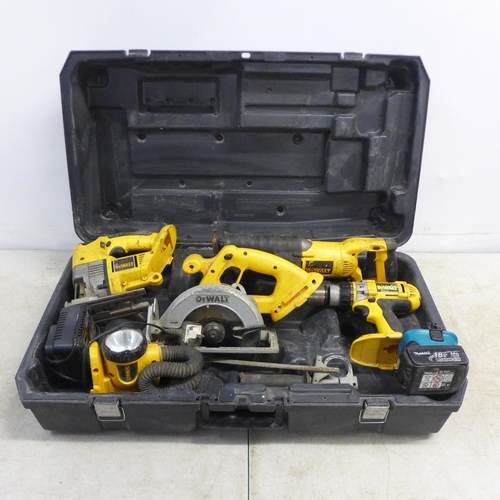 2017 - A DeWalt power tool set including a DC988 power drill, DC390 rip saw, DW933 jigsaw, power saw, DW919... 