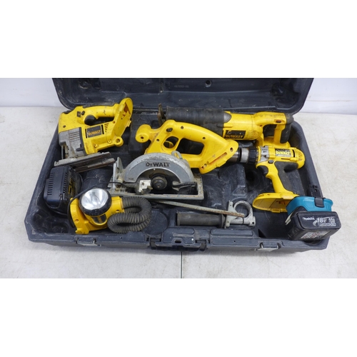 2017 - A DeWalt power tool set including a DC988 power drill, DC390 rip saw, DW933 jigsaw, power saw, DW919... 