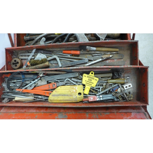 2031 - A red metal toolbox with a large quantity of drill bits, pliers, files, a G-clamp, mini wrenches