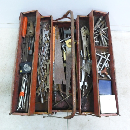 2033 - 4 metal cantilever tool boxes with assorted hand tools including spanners, sockets, drill bits etc.