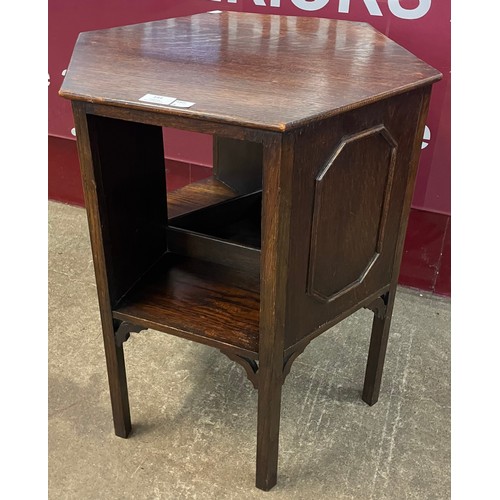 144 - An early 20th Century oak hexagonal coffee table