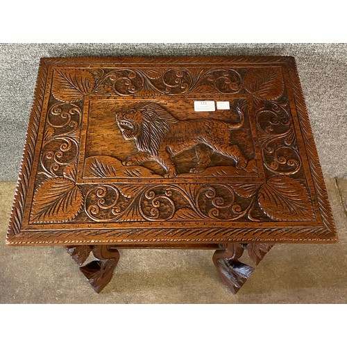 123 - An early 20th Century Burmese carved hardwood occasional table