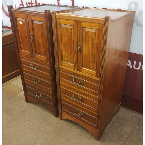 131 - A pair of Victorian and later walnut side cabinets