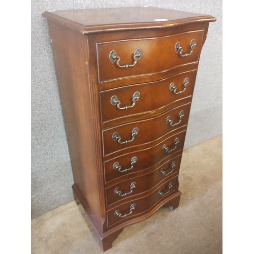 137 - A George III style mahogany serpentine chest of drawers