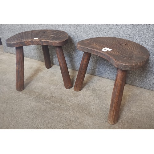 139 - A pair of Victorian elm milking stools