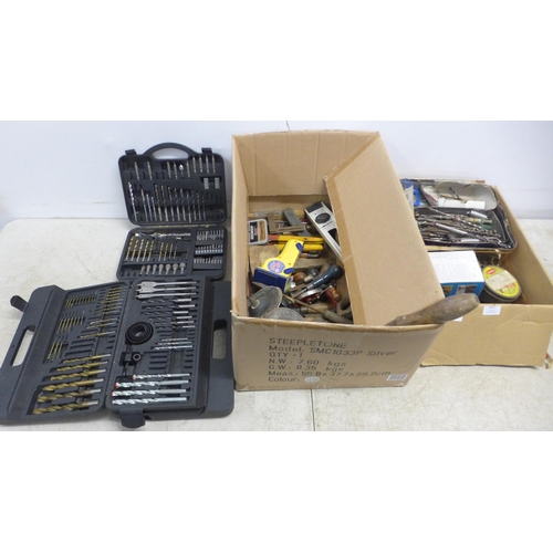 2057 - Two boxes of assorted hand tools including word working tools, drill bits, spanners, etc.