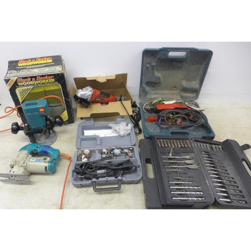 2066 - A quantity of power tools including  - A Dremel 395 type 5 rotary tool 21/ov in case, Black and Deck... 