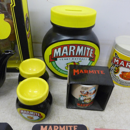 2076 - A large collection of Marmite items including a canvas print, oven glove, cheese tool set, egg cups,... 