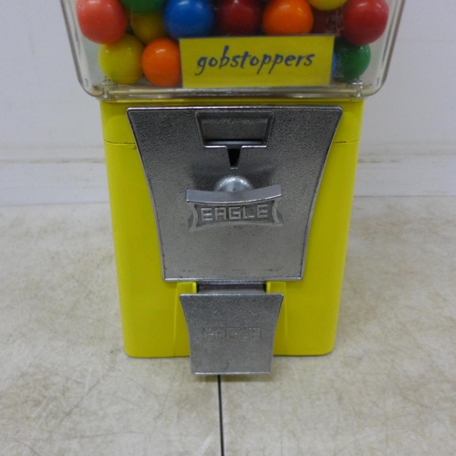 2087 - A vintage Eagle sweet dispenser with key