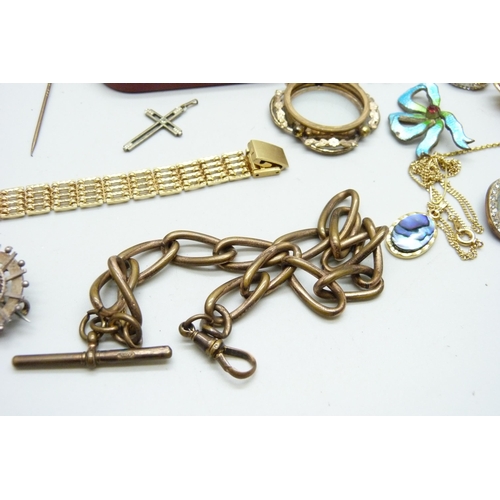 1006 - A collection of costume jewellery, stick pins, an Albert chain, etc.