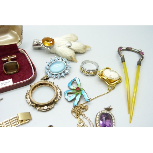 1006 - A collection of costume jewellery, stick pins, an Albert chain, etc.