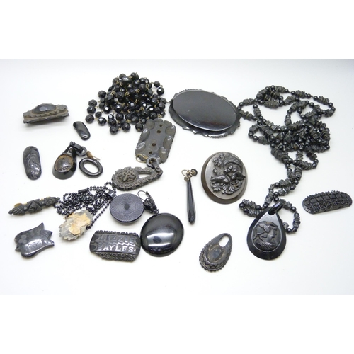 1025 - A collection of jet jewellery, some a/f, a French jet brooch and a black pendant