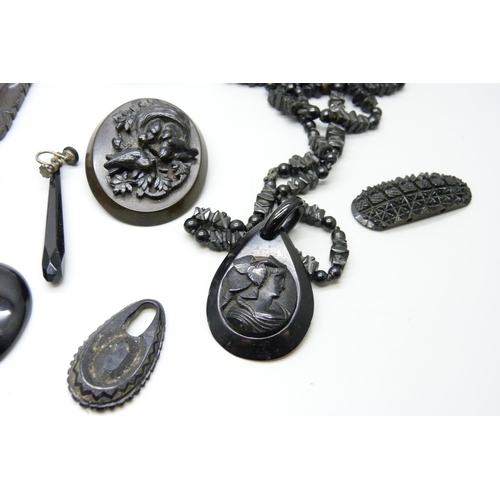 1025 - A collection of jet jewellery, some a/f, a French jet brooch and a black pendant