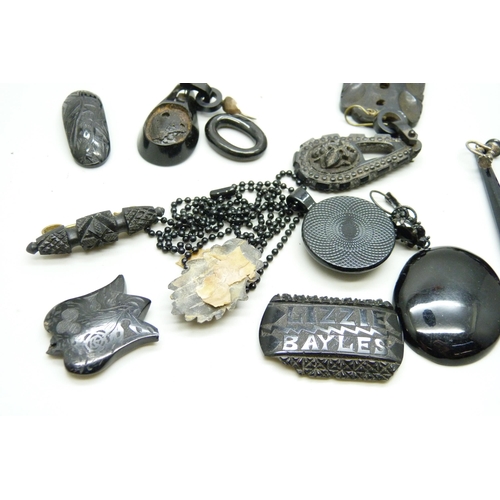 1025 - A collection of jet jewellery, some a/f, a French jet brooch and a black pendant