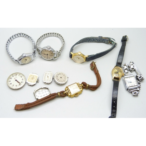 1027 - A collection of lady's wristwatches including Oris and four watch movements including two Tudor