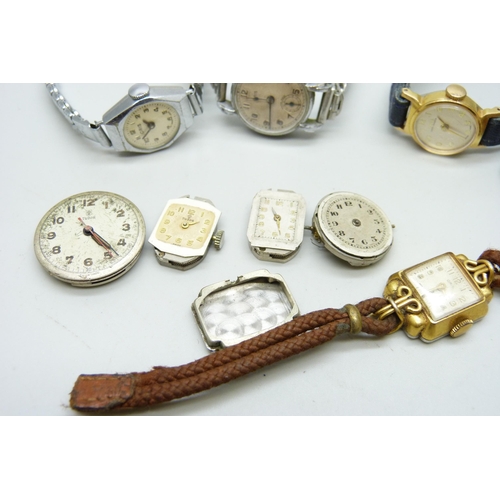 1027 - A collection of lady's wristwatches including Oris and four watch movements including two Tudor