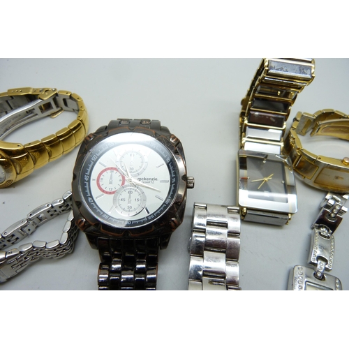 1035 - A collection of fashion watches including DKNY, Karen Millen, Emporio Armani, etc.