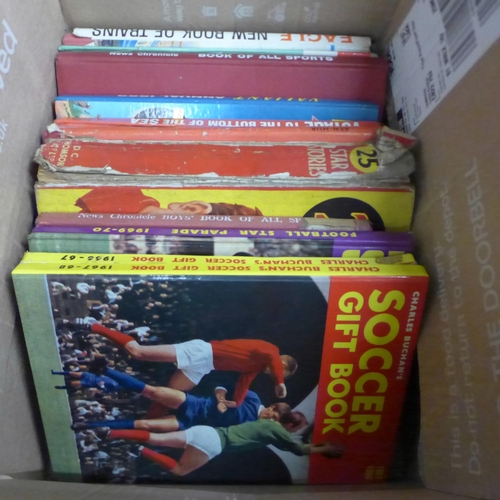 1042 - A box of mid century children's annuals, including two Charles Buchan's football books, 1960s Victor... 