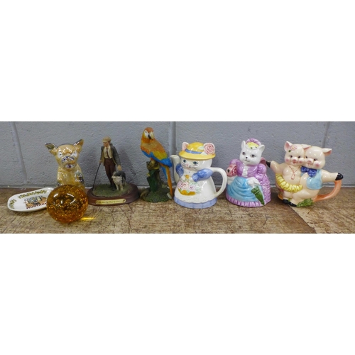 1080 - Novelty tea pots and a RAF tea cosy, ceramic Bonzo dog, two resin figures, two advertising dishes, a... 