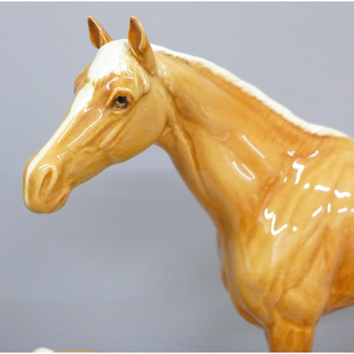 615 - Three Beswick Palomino horses, large racehorse with one hind leg a/f