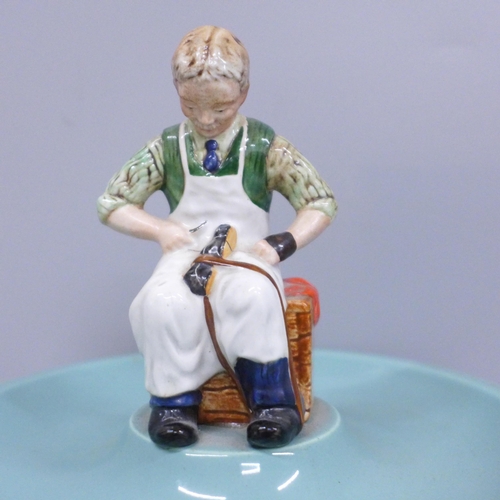 629 - A Timpson Fine Shoes centenary figural dish by Beswick