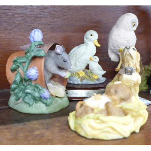 631 - A Border Fine Arts figure marked (Ray) Ayres, a Cherished Teddies figure and seven other figures